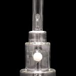 Clear glass rig with bubbler and downstem, isolated on a black background.