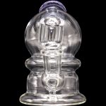 Clear glass dab rig with intricate bubbler design.