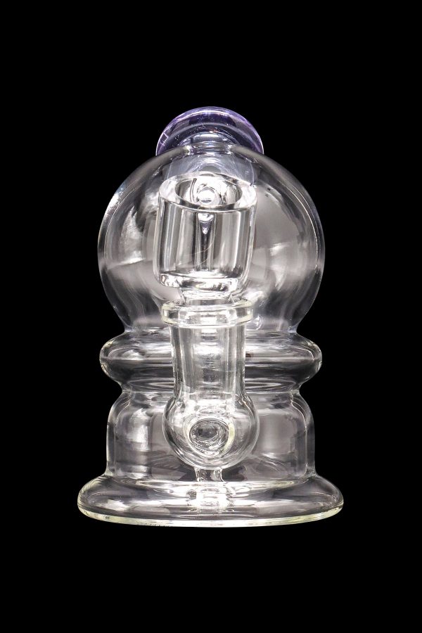 Clear glass dab rig with intricate bubbler design.
