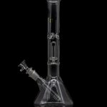 Clear glass bong with intricate percolators, isolated on a black background.