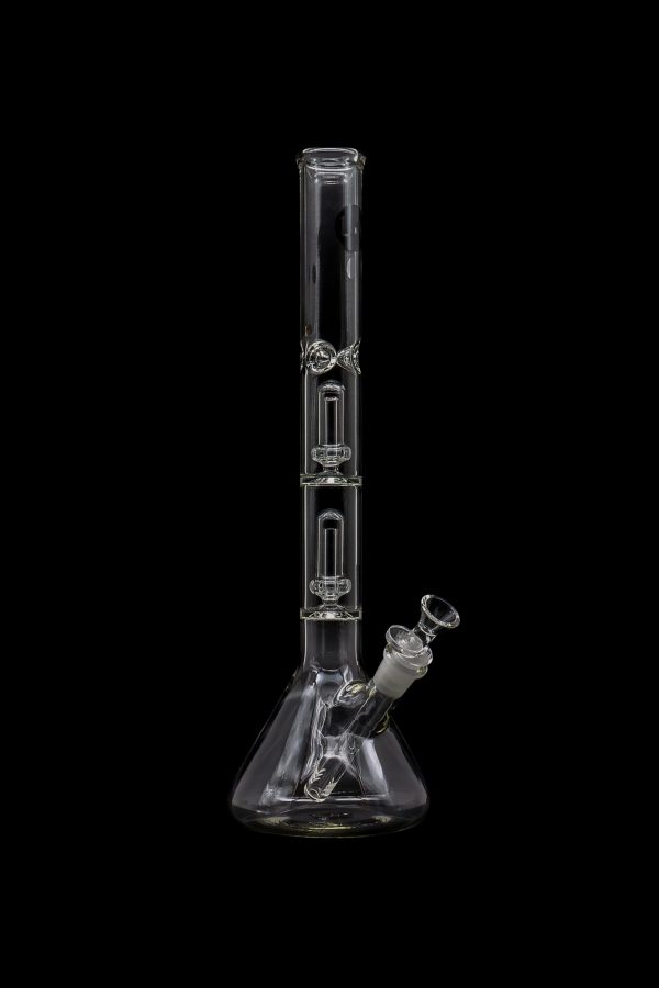 Clear glass bong with multiple perc filtration chambers, isolated on a black background.