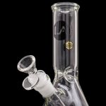 A studio shot of the LA Pipes Basic Beaker Water Pipe - Simply Guy, displaying its clear glass construction and beaker shape.