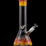 A glass bong with orange and yellow swirls, isolated on a black background.