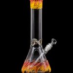 Glass bong with orange and yellow swirls against a black background.