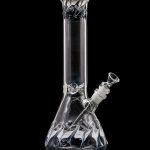 Clear glass water pipe (bong) with intricate swirling designs, isolated on a black background.