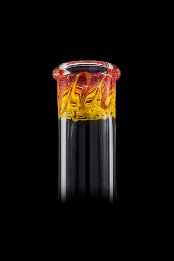 Handblown glass cannabis oil rig attachment with vibrant orange and yellow swirling patterns.