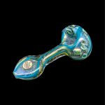 Blue glass smoking pipe with colorful swirls and a metal tag.