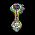 Hand-blown glass pipe with colorful swirls and a glass marble, labeled "LA Pipes - Made in USA - Los Angeles."