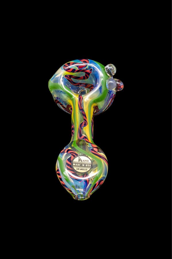 Hand-blown glass pipe with colorful swirls and a glass marble, labeled "LA Pipes - Made in USA - Los Angeles."