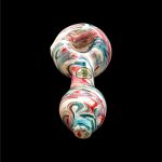 A vibrant glass pipe with a swirling red, white, and blue pattern, against a black background.