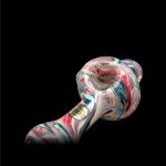 Hand-blown glass pipe with vibrant red, blue, and white swirls against a black background."
