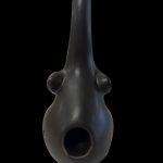 Black glass oil rig with a unique, bulbous shape and mouthpiece.