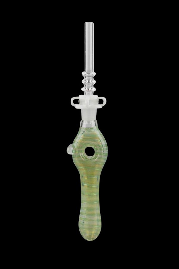 Green glass dab rig with a detailed design and spherical collection chamber.
