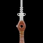 Red and cream striped glass oil rig with a cylindrical mouthpiece.