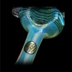Blue glass cannabis pipe with "Made in USA Los Angeles" label against a black background.