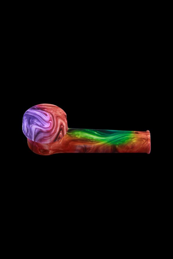 Colorful glass pipe on a black background.