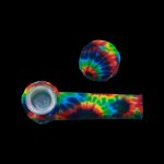 Colorful silicone pipe and cap set against a black background.