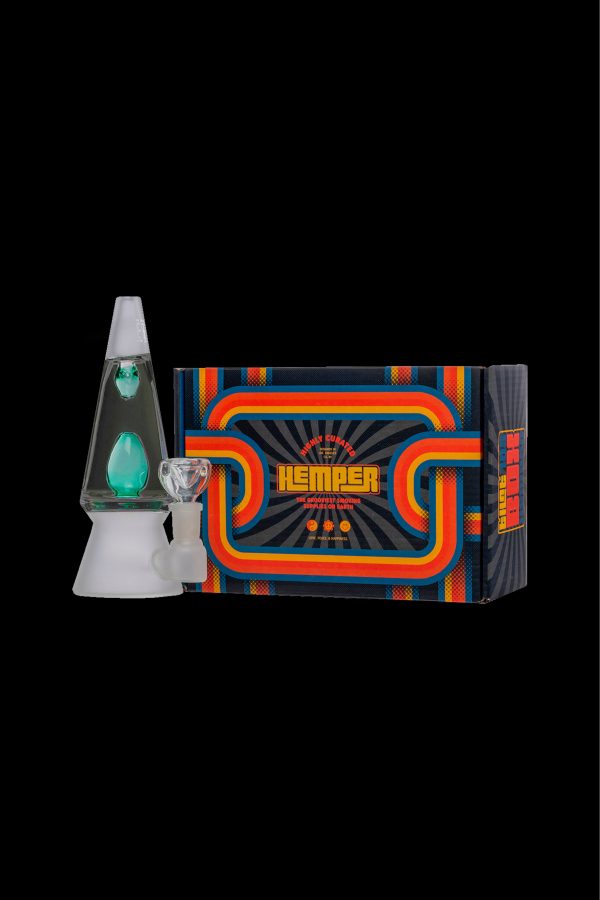 A retro-styled cannabis water pipe and packaging, featuring a clear, conical “spaceship” piece with a teal-colored interior, set against a vibrant orange and brown box with psychedelic designs.