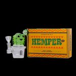 A vibrant green cactus-shaped water pipe stands beside a decorated box labeled "Hempter Cactus Jack Vol. 2" with text indicating “highly curated” smoking accessories.