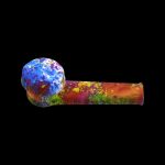 Colorful glass pipe on a black background.