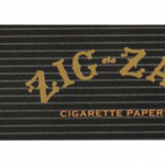 Front view of the Zig Zag King Size Rolling Papers - 24 Pack, showcasing a colorful pack with text and branding.