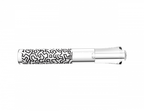 A close-up, side view of the K.Haring Taster Chillum Pipe, displaying its patterned design against a plain white backdrop.