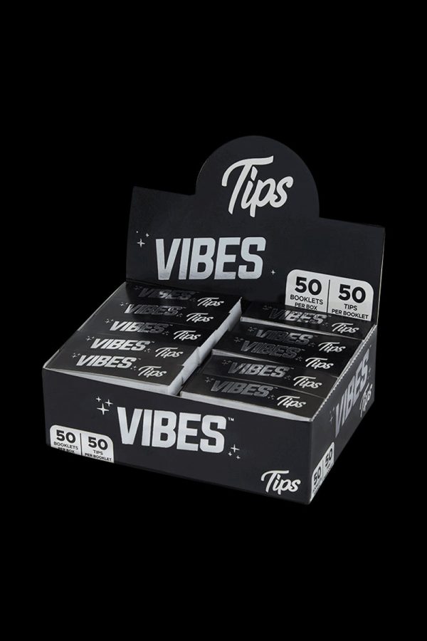 A close-up shot of the VIBES Rolling Tips Box - 50 Pack, displaying a stack of booklets with bold branding.