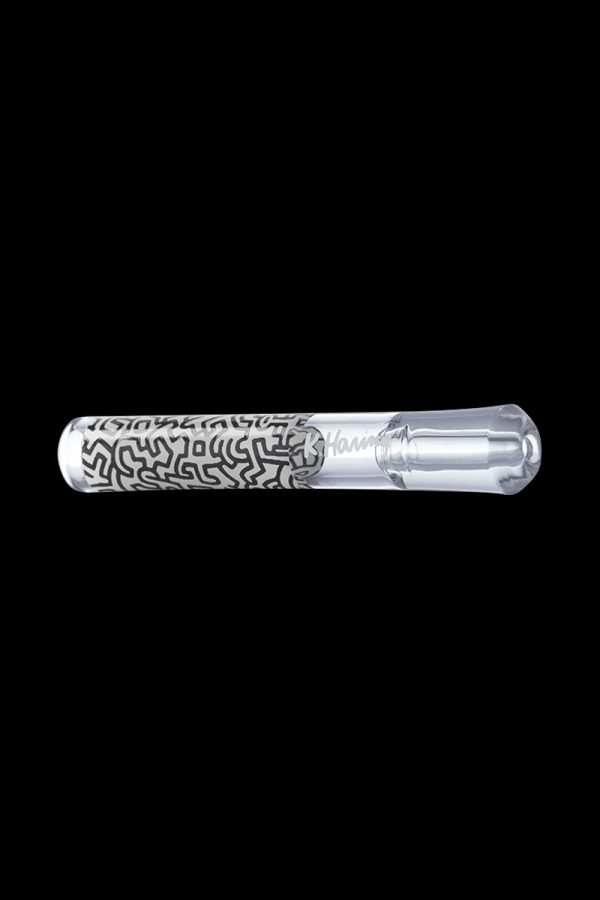 A straight-on view of the K.Haring Taster Chillum Pipe, showcasing its simple, handheld design against a dark background.