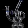 Clear glass water pipe (rig) with intricate curves and blue accents, isolated on a black background.