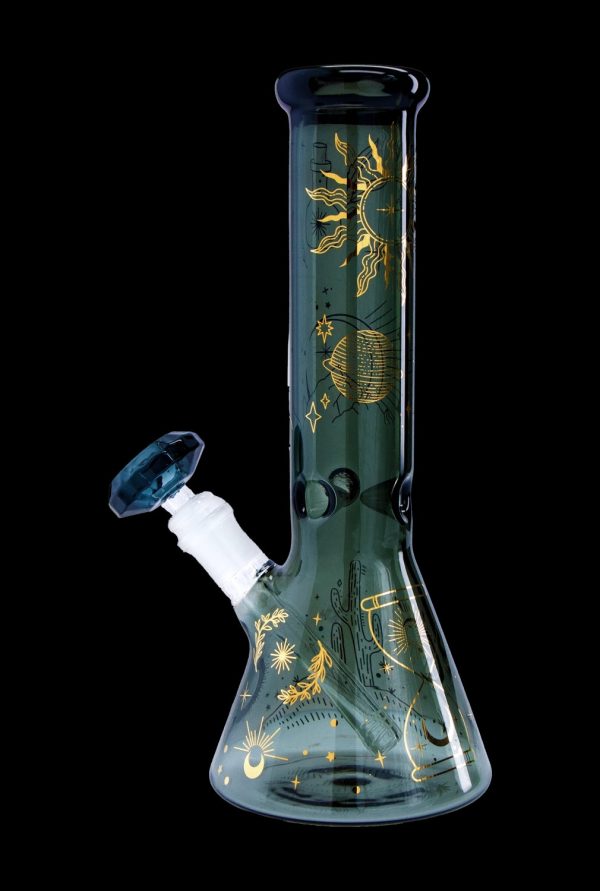 Green glass bong with gold celestial and desert botanical illustrations.