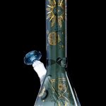 Green glass bong with gold celestial designs.