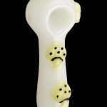 Pale green glass pipe decorated with black paw prints.