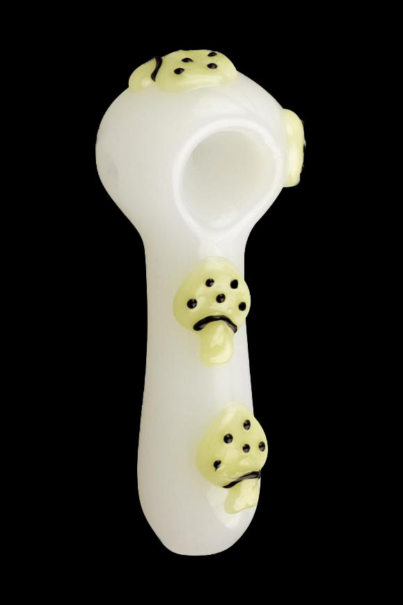 Pale green glass pipe decorated with black paw prints.