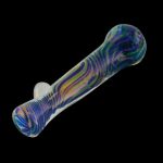 A close-up shows the Multicolor Borosilicate Glass Chillum Taster with a vibrant, multicolored design against a black backdrop.