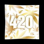 Square glass ashtray with gold “420” lettering and cannabis leaf pattern.