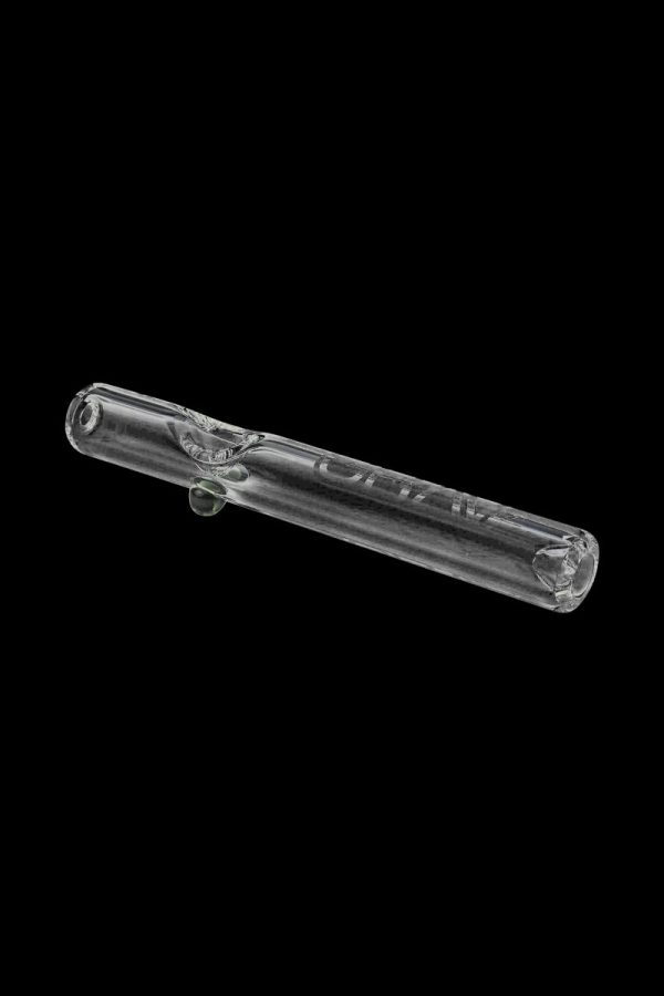 A side view of the GRAV® Clear Classic Steamroller, showing the transparent glass pipe against a dark background.