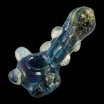 A detailed close-up of “The Cosmic Marble” heavy glass pipe showcasing its swirling blue and clear glass design.