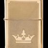 Gold Zippo-style lighter engraved with a crown and cannabis leaf.