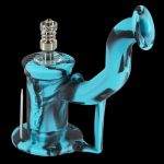 Blue and black silicone oil rig with a quartz banger and dab tool.