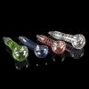 Assortment of colorful glass smoking pipes on a reflective black surface.