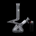 Clear glass bong with a bowl piece and lighter on a black background.