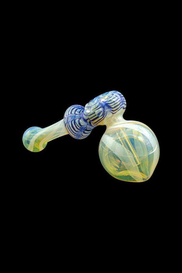 Glass bubbler water pipe with blue and yellow swirls on a black background.