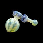 Hand-blown glass bubbler with swirling blue and pale green patterns, isolated on a black background.