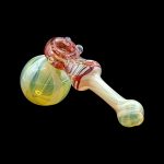Hand-blown glass cannabis pipe with red and yellow swirls.