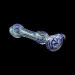 Glass pipe with blue and white swirls against a black background.