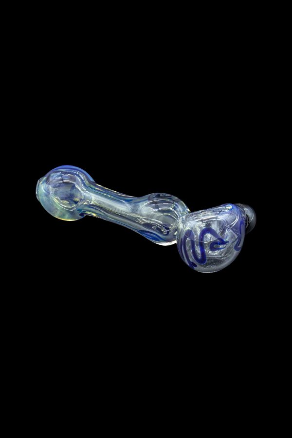 Glass pipe with blue and white swirls against a black background.