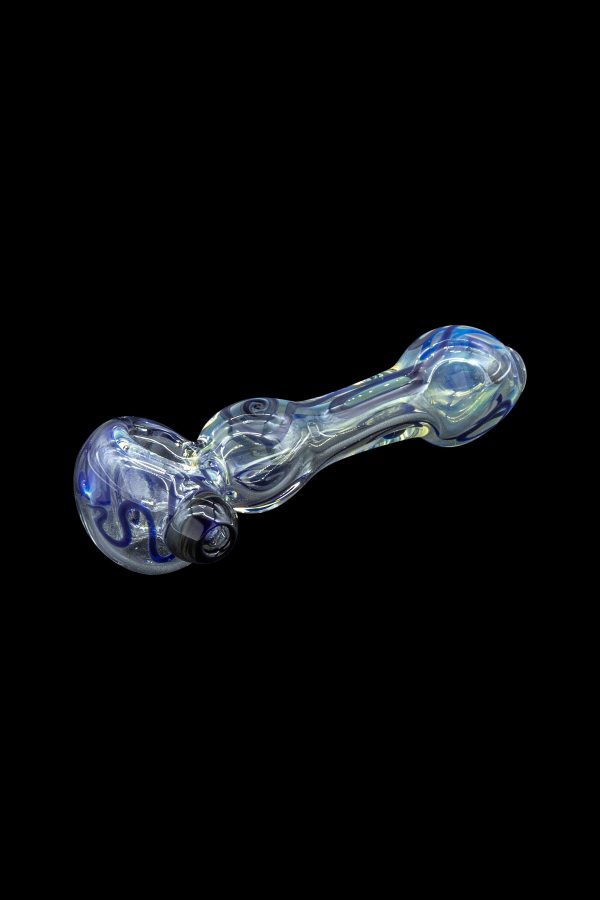 Glass pipe with swirling blue and iridescent patterns, isolated on a black background.