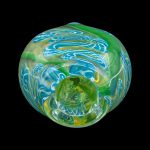 Green glass cannabis water pipe with swirling blue and yellow patterns.