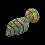 Hand-blown glass cannabis oil burner pipe with vibrant green, red, and yellow swirls.