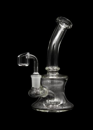 Clear glass dab rig with a quartz banger, isolated on a black background.